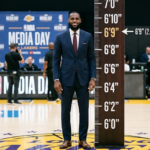 LeBron James height comparison photo showing his 6-foot-9 frame on the basketball court