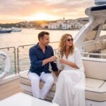 Luxury yacht sailing at sunset, illustrating the realistic costs of the millionaire lifestyle and yacht ownership.